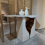 Sculptural White Console Table with Fluid Cutout and Polished Gold Interior Core